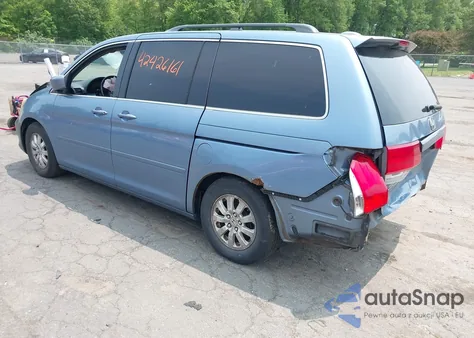 2010 Honda Odyssey Ex-L z USA, uszkodzony, nr VIN 5FNRL3H79AB084193